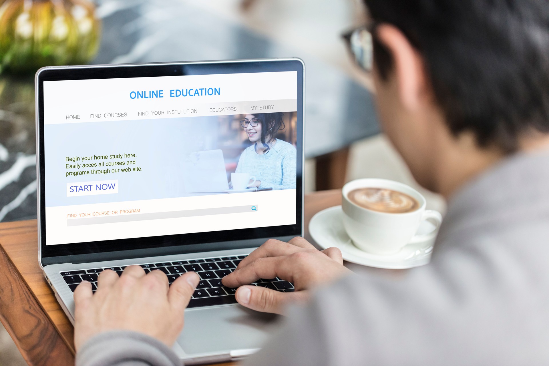 Young man using online education website